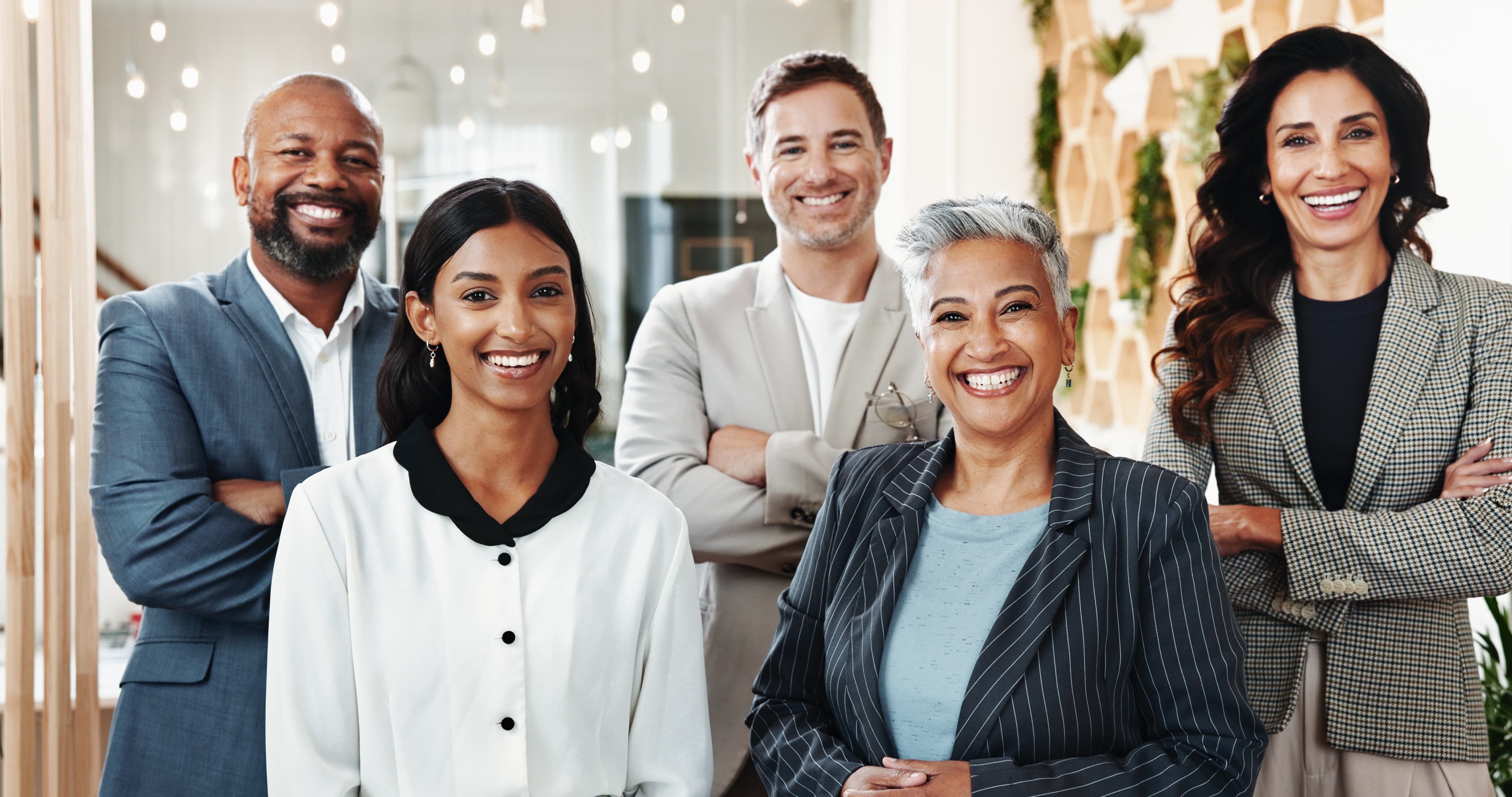 A diverse family standing in front of their new Miami-Dade home